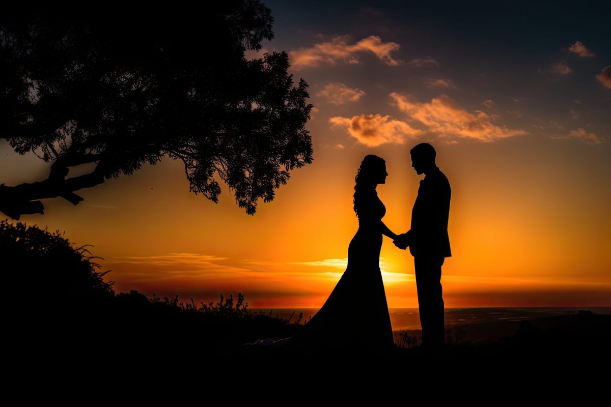 Vecteezy silhouette of a newlywed couple on the background of the 25501200 scaled.jpg