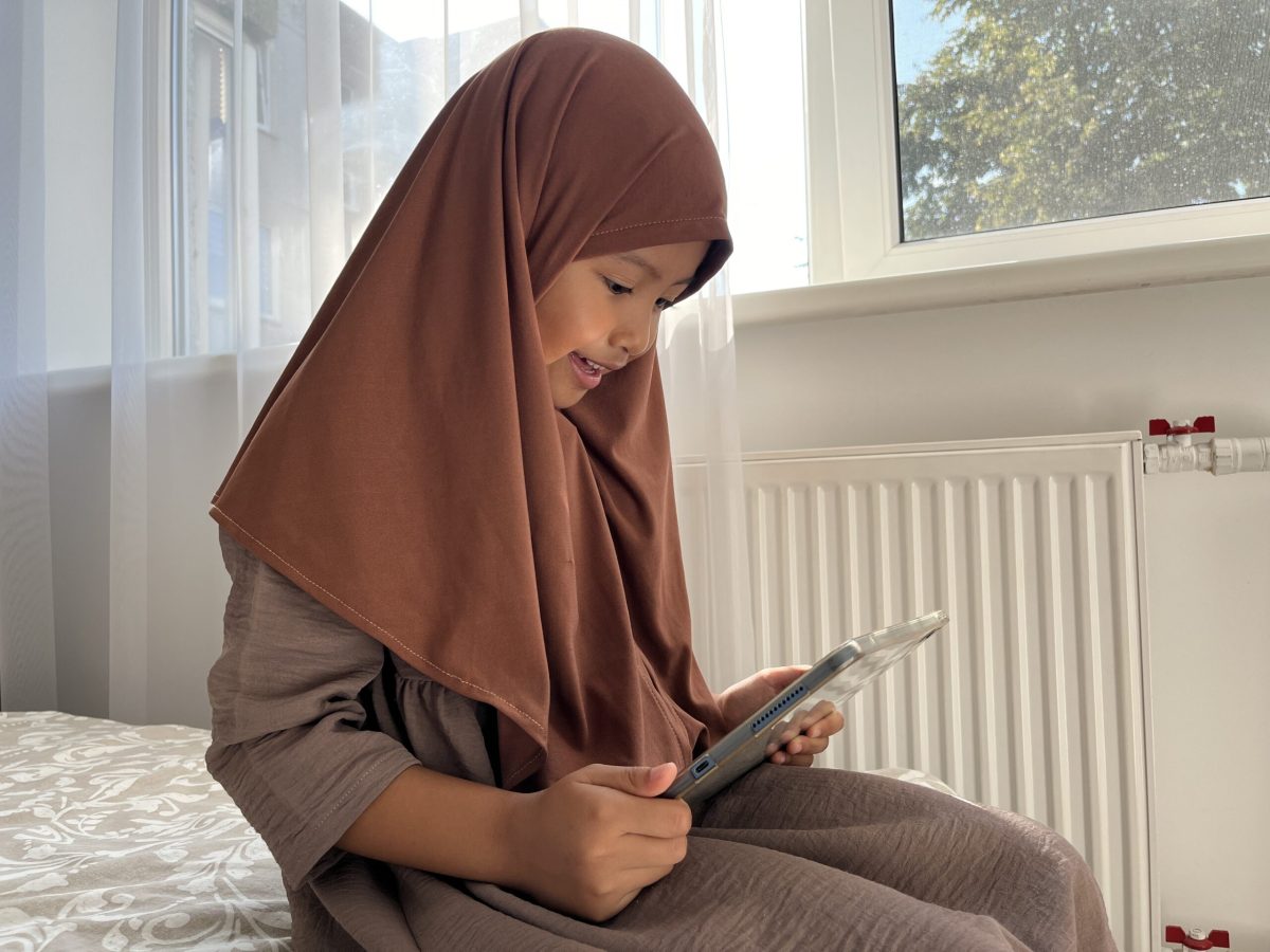 Vecteezy asian muslim little girl wearing hijab sitting near window 49574647 scaled.jpg