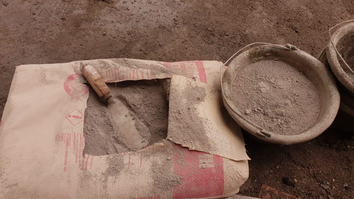 Vecteezy cement powder in a cardboard bag and a shovel inside 34530139 1 scaled.jpg