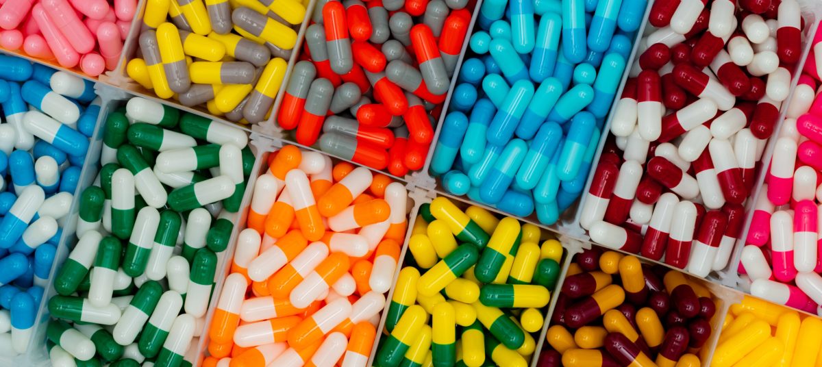 Vecteezy top view of colorful capsule pills in plastic box 7766859 1 scaled.jpg