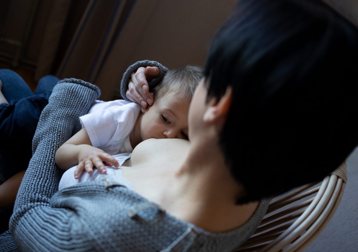 Vecteezy young woman breastfeeding her little son while sitting in a 46907310 scaled.jpg