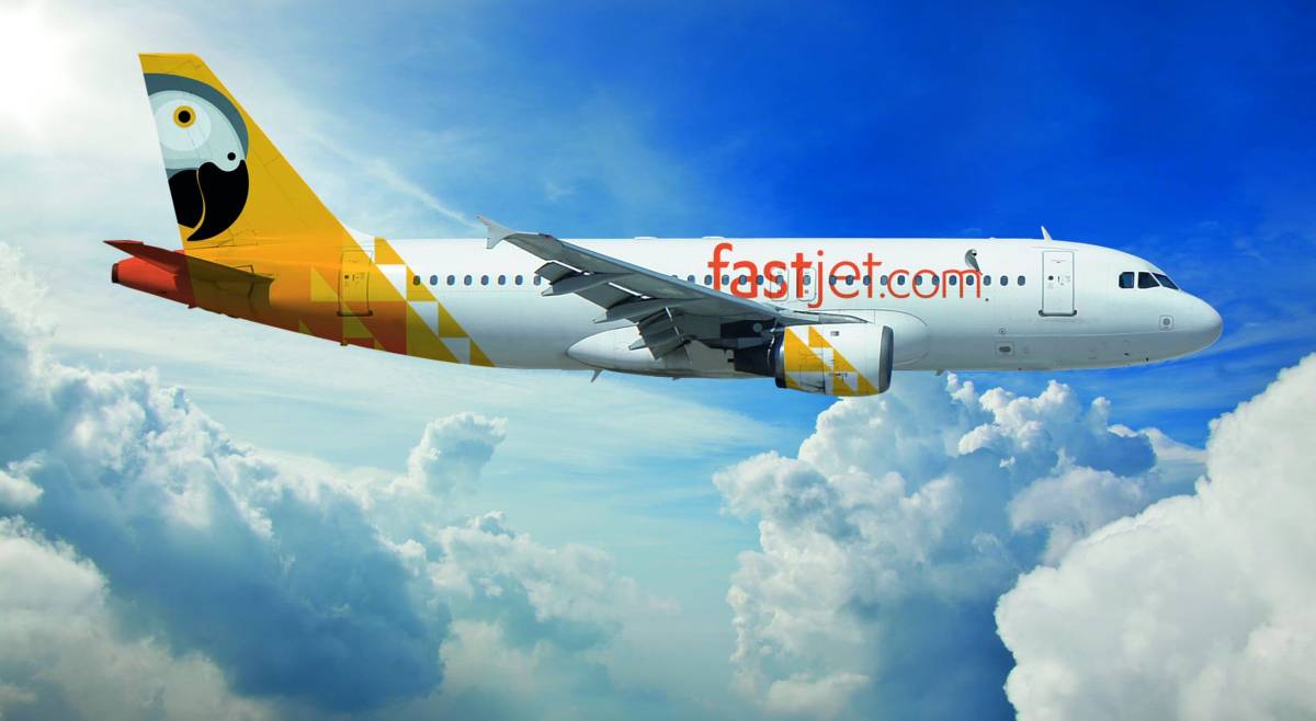 02 plane feetup clouds highres final.jpg
