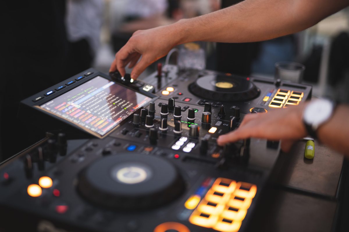 Vecteezy a dj plays music on a controller at a party 39955678 scaled.jpg