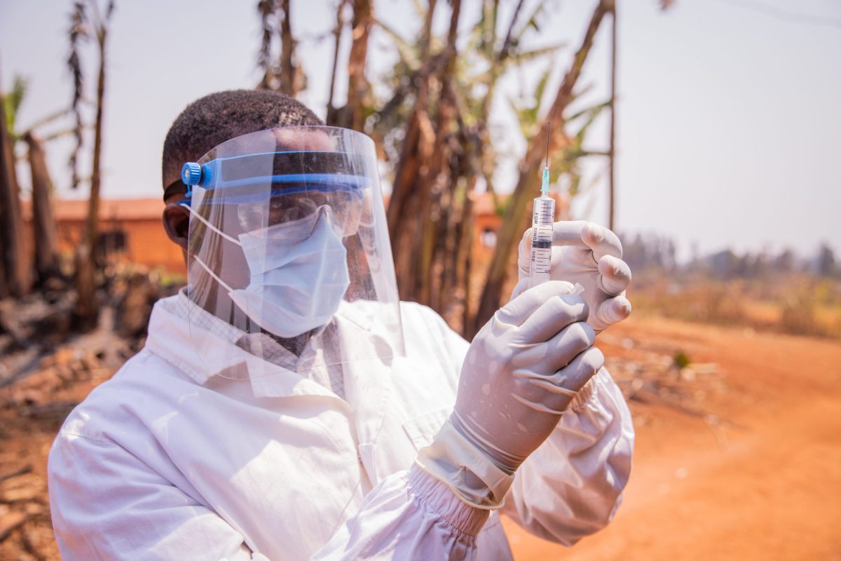 Vecteezy a doctor in africa checks the vaccine syringe 46988881 1 scaled.jpg