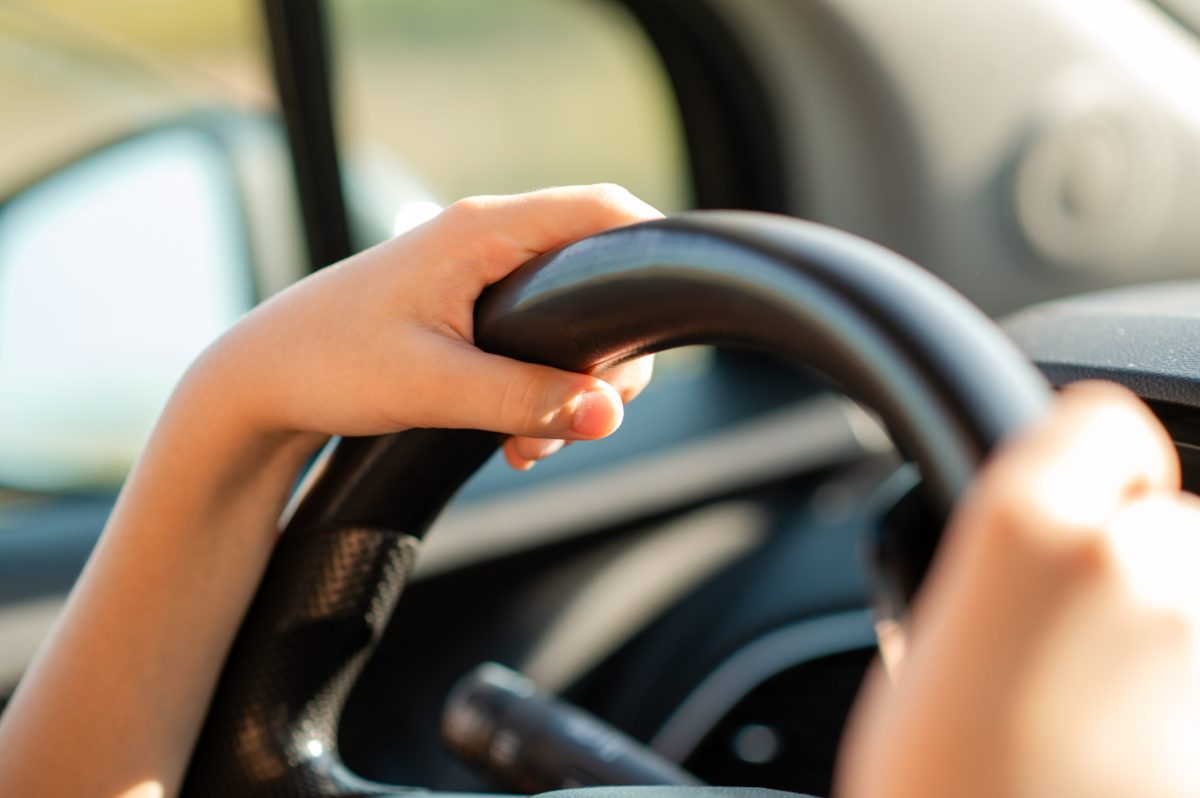 Vecteezy close up of small childrens hands holding the steering wheel 71035249 scaled.jpg