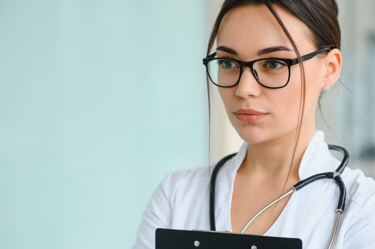Vecteezy portrait of young female doctor standing in hospital 46382367 scaled.jpg