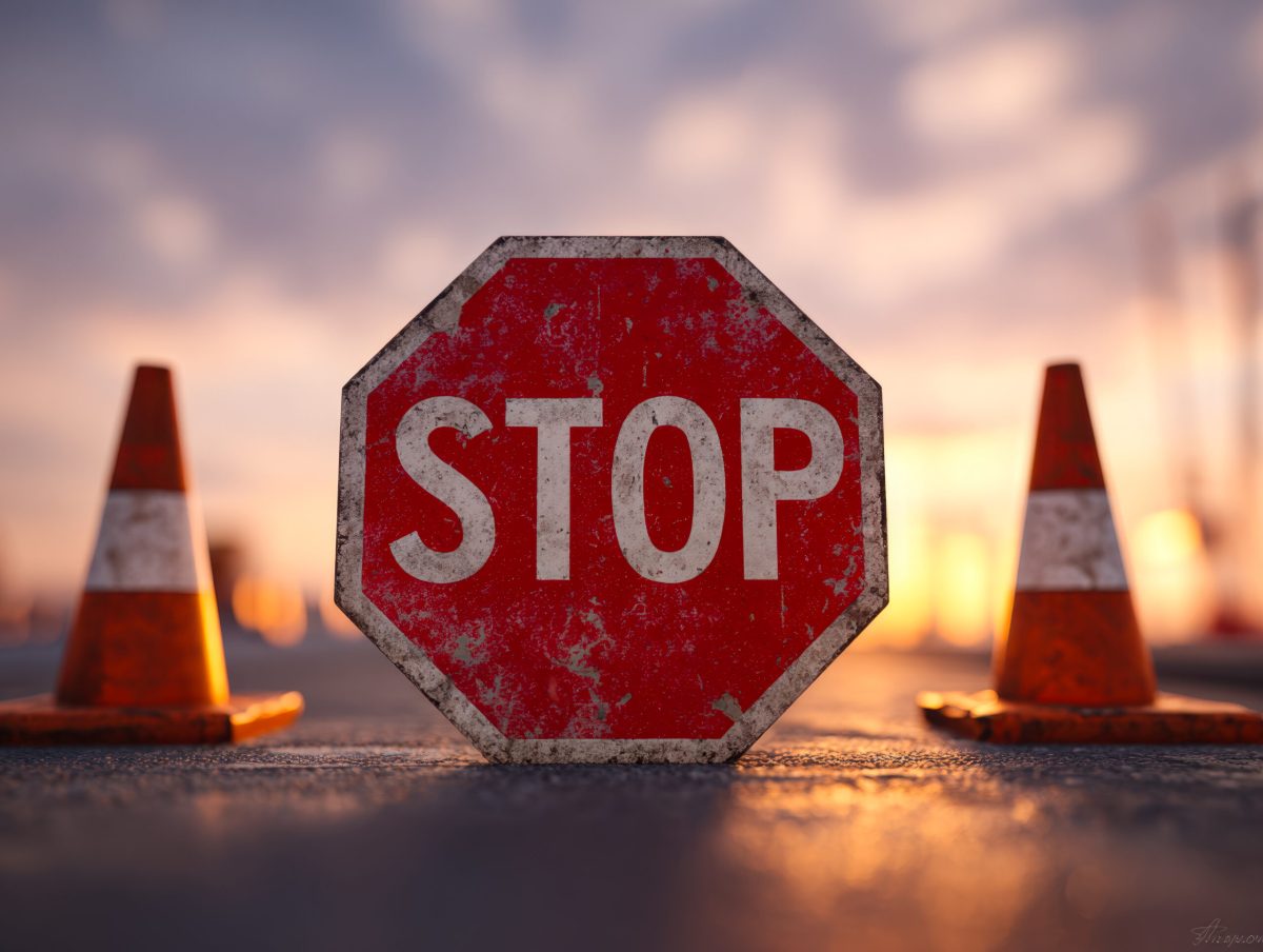 Vecteezy weathered stop sign surrounded by traffic cones at sunset 69594226 scaled.jpg