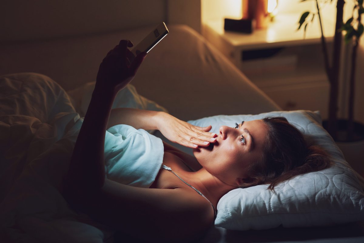 Vecteezy woman at night in bed with phone 23413781 scaled.jpg