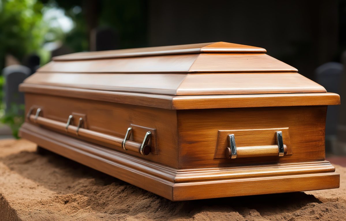 Vecteezy wooden burial coffin nestled in earth surrounded by flowers 72646432 3 scaled.jpeg