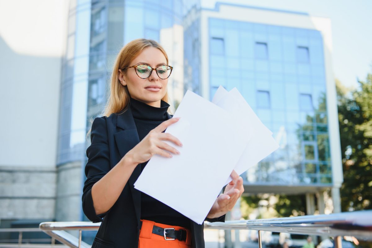Vecteezy young business woman walking near office building 46752040 scaled.jpg
