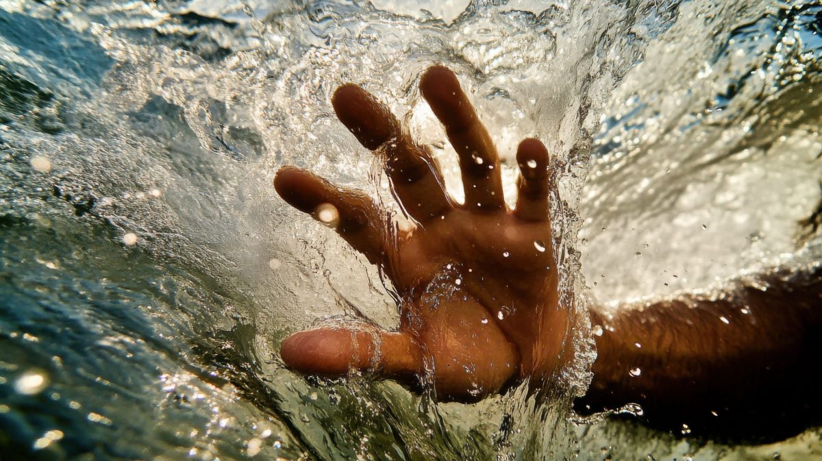 Vecteezy a person s hand is in the water and is being splashed 71014307 scaled.jpeg