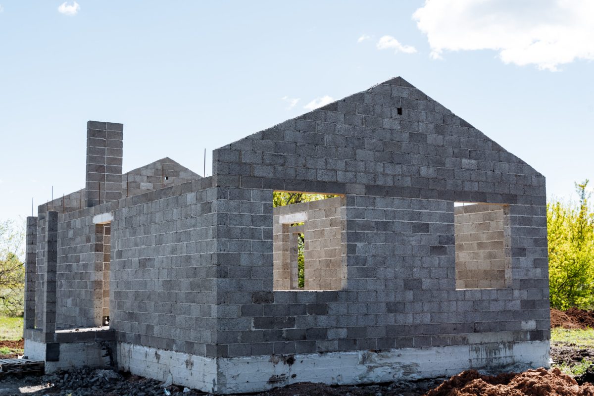 Vecteezy brick house rising in field against sky surrounded by 54819063 1 scaled.jpg