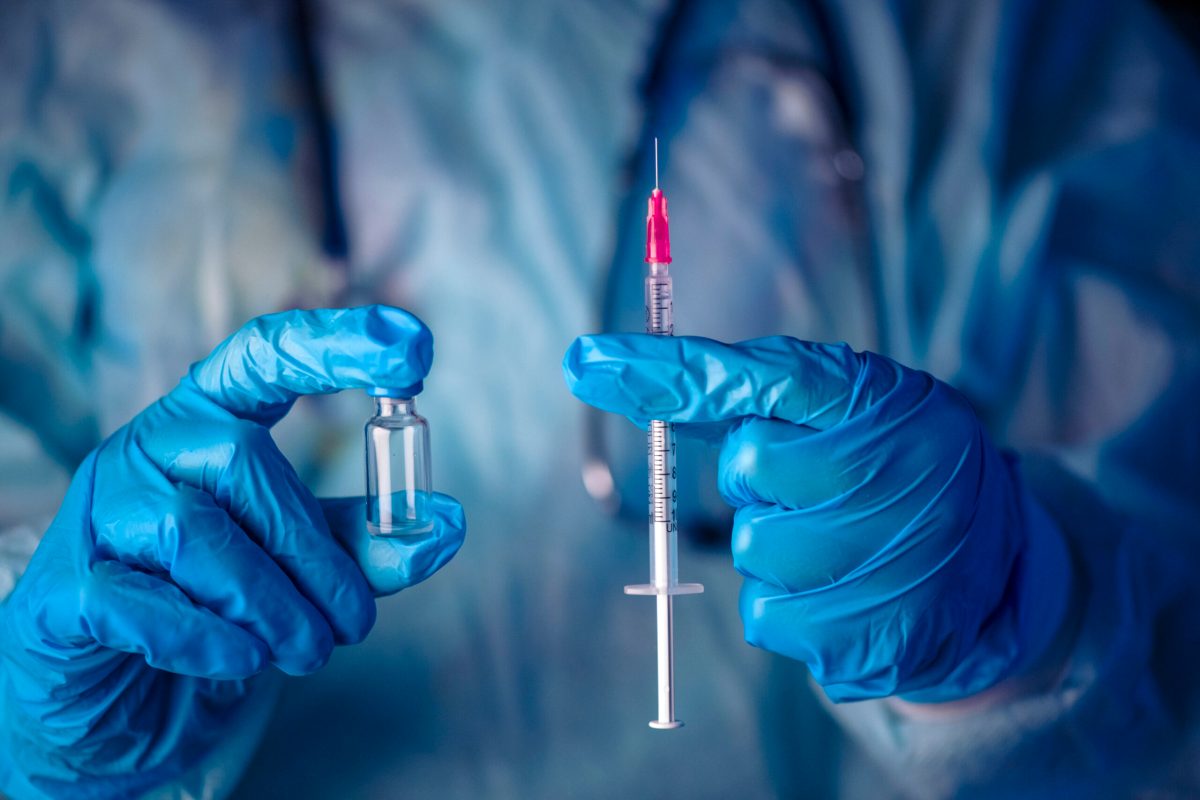Vecteezy medical hand glove blue vial vaccine hypodermic needle 1523284128129 1 scaled.jpg