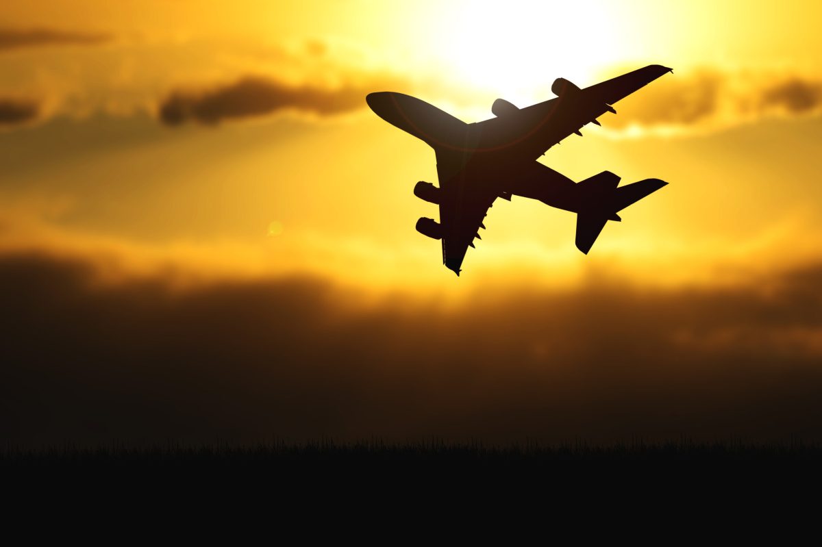 Vecteezy silhouette of a passenger plane taking off from the airport 6966411 scaled.jpg