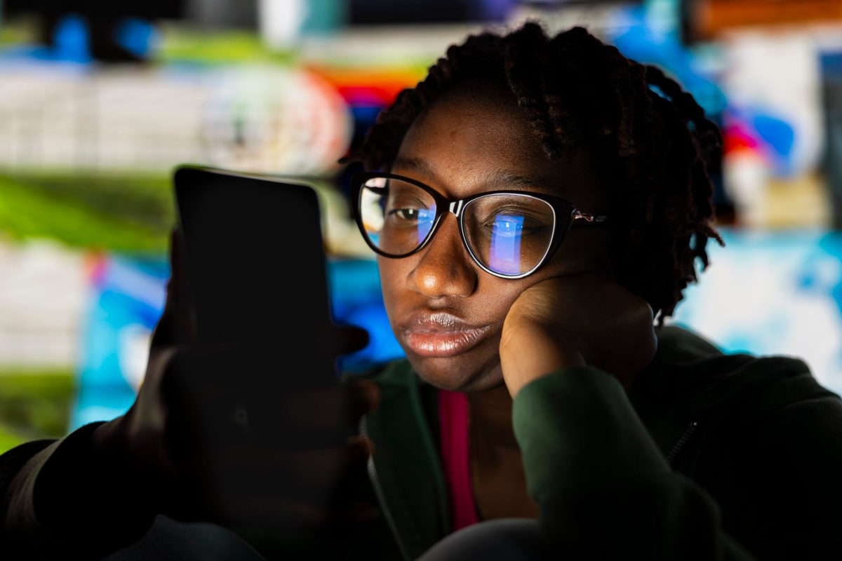 Vecteezy woman looking at mobile phone screen with dull expression 72262873 scaled.jpg
