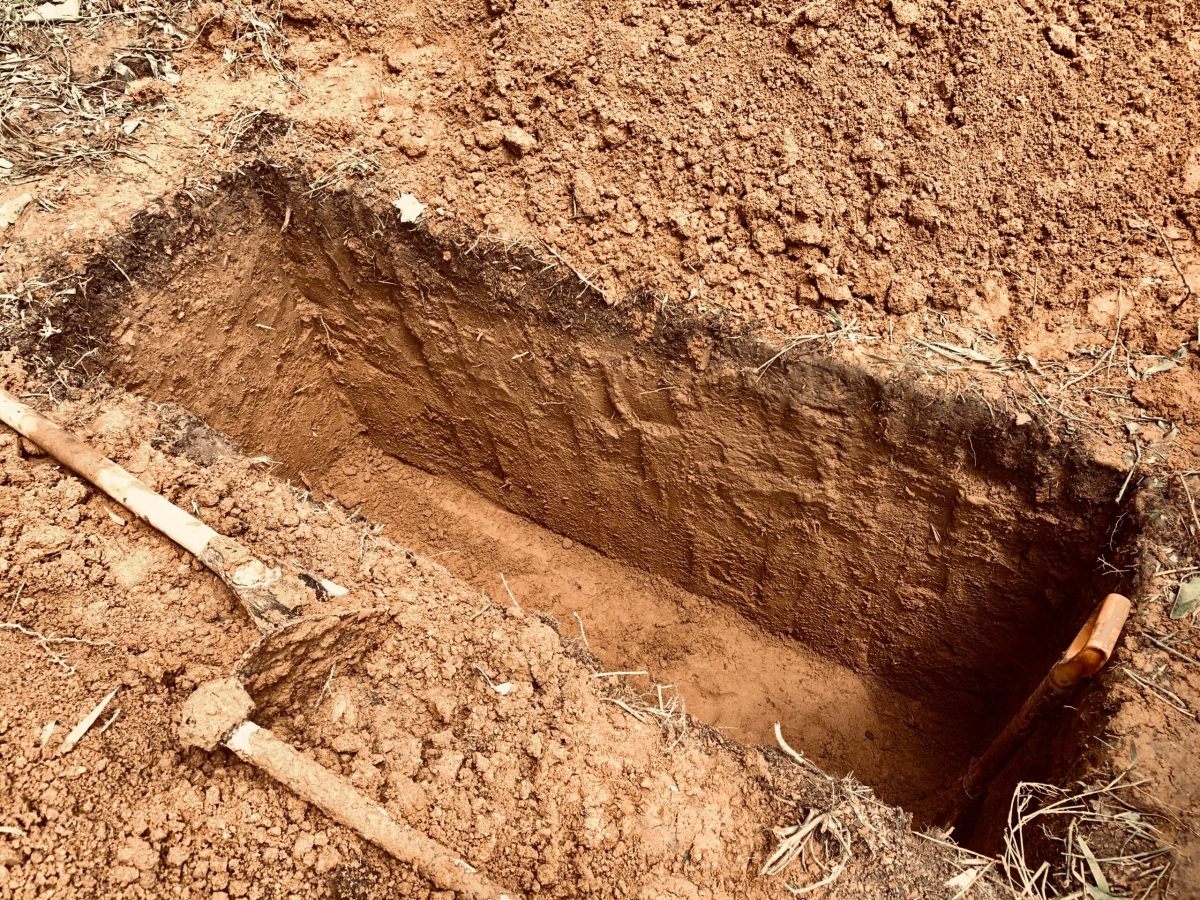 Vecteezy grave with shovel and shovel in the ground 46029151 scaled.jpeg
