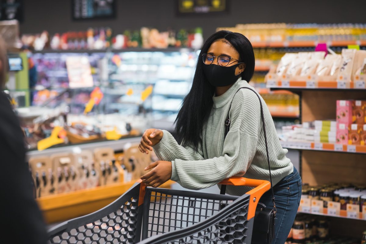 Vecteezy african woman wearing disposable medical mask shopping in 41759015 scaled.jpg