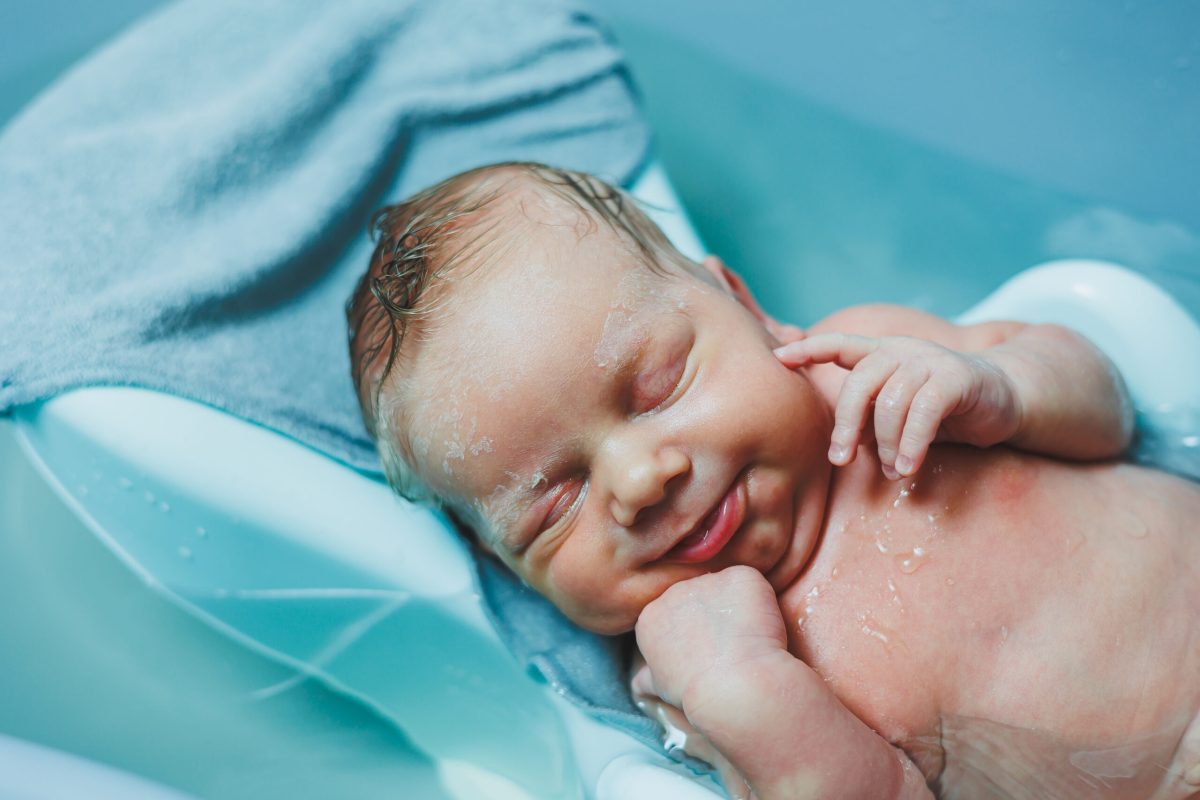 Vecteezy bathing a newborn baby in a bathtub newborn s first bath 54480582 scaled.jpg