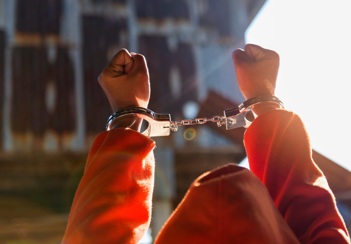 Vecteezy desperate criminal man sitting on the floor in handcuffs 13629061 scaled.jpg