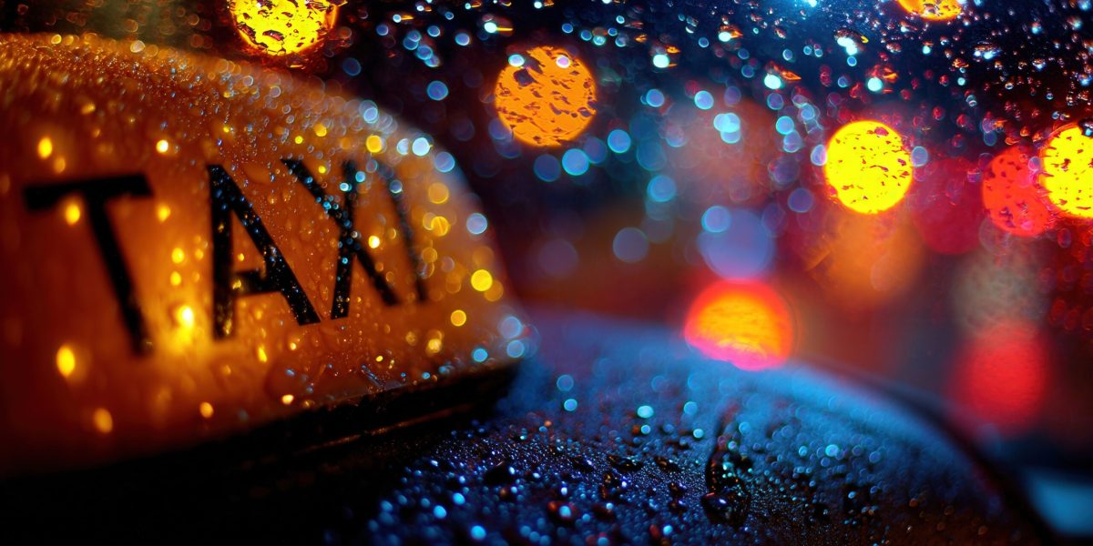Vecteezy rainy night scene with a glowing taxi cab sign in the city 71611640 scaled.jpeg