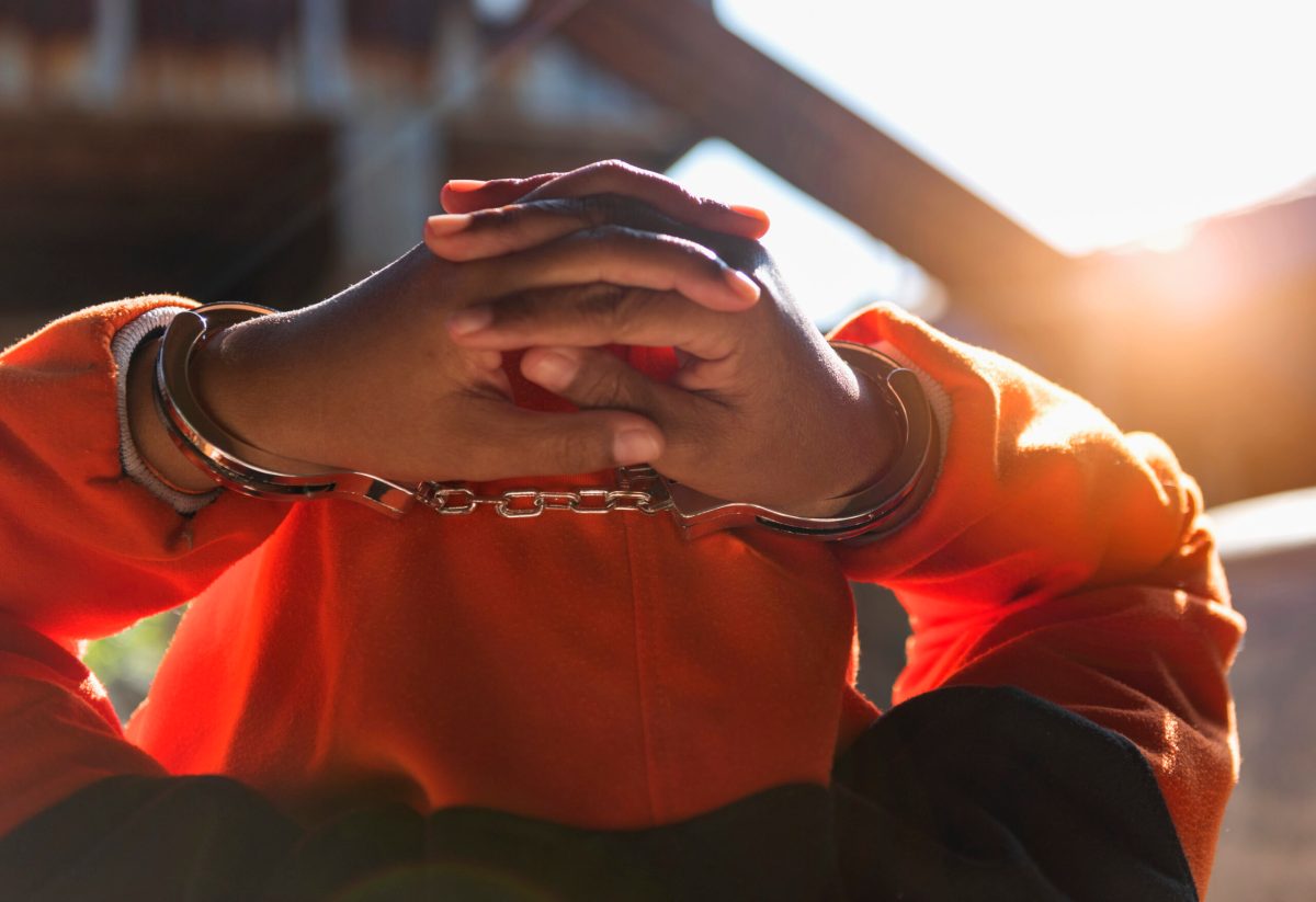 Vecteezy desperate criminal man sitting on the floor in handcuffs 13629151 scaled.jpg