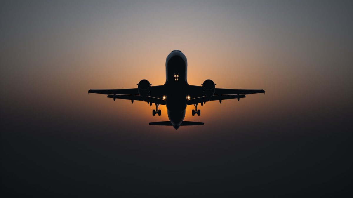 Vecteezy monochrome airplane silhouette against a gradient sunset sky 47717690 1 scaled.jpg