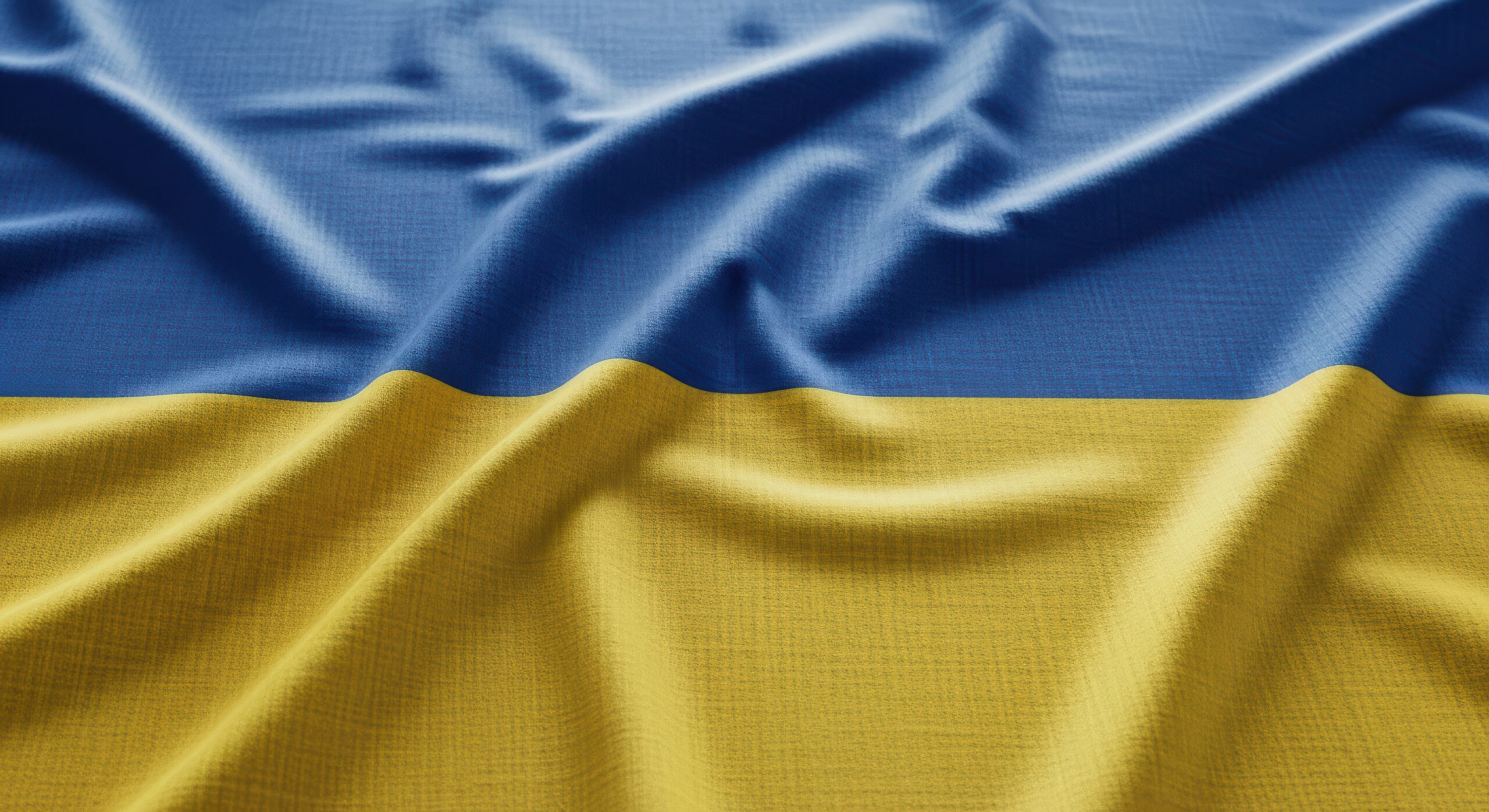Vecteezy wavy ukrainian flag texture close up 74176636 scaled.jpeg